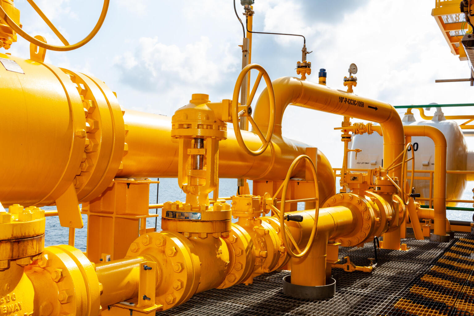 Valves and pipework on the deck of an offshore oil and gas processing platform